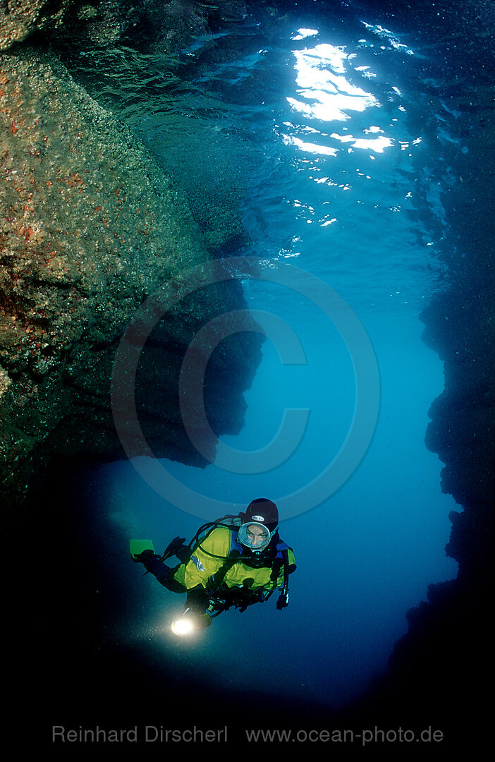 Scuba diver in underwater cave, Mediterranean Sea, Costa Brava, Spain