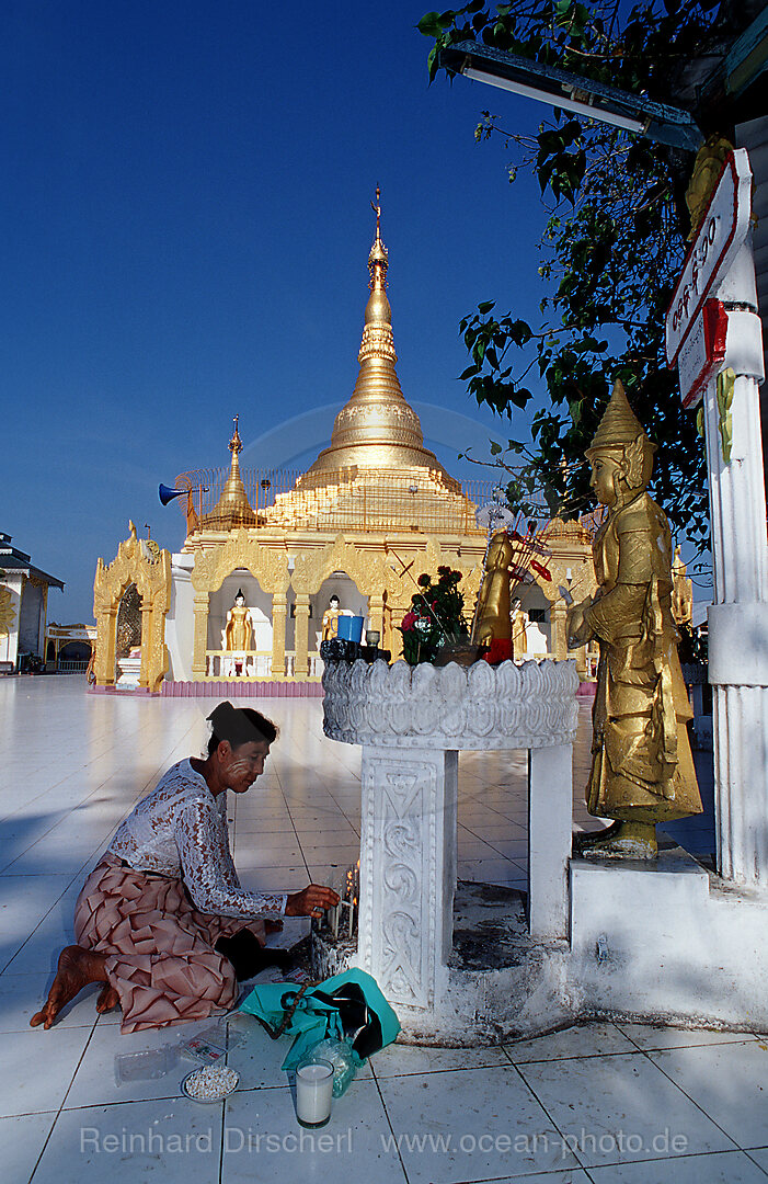 Praying woman in temple, Kawthaung, Burma, Myanmar, Birma