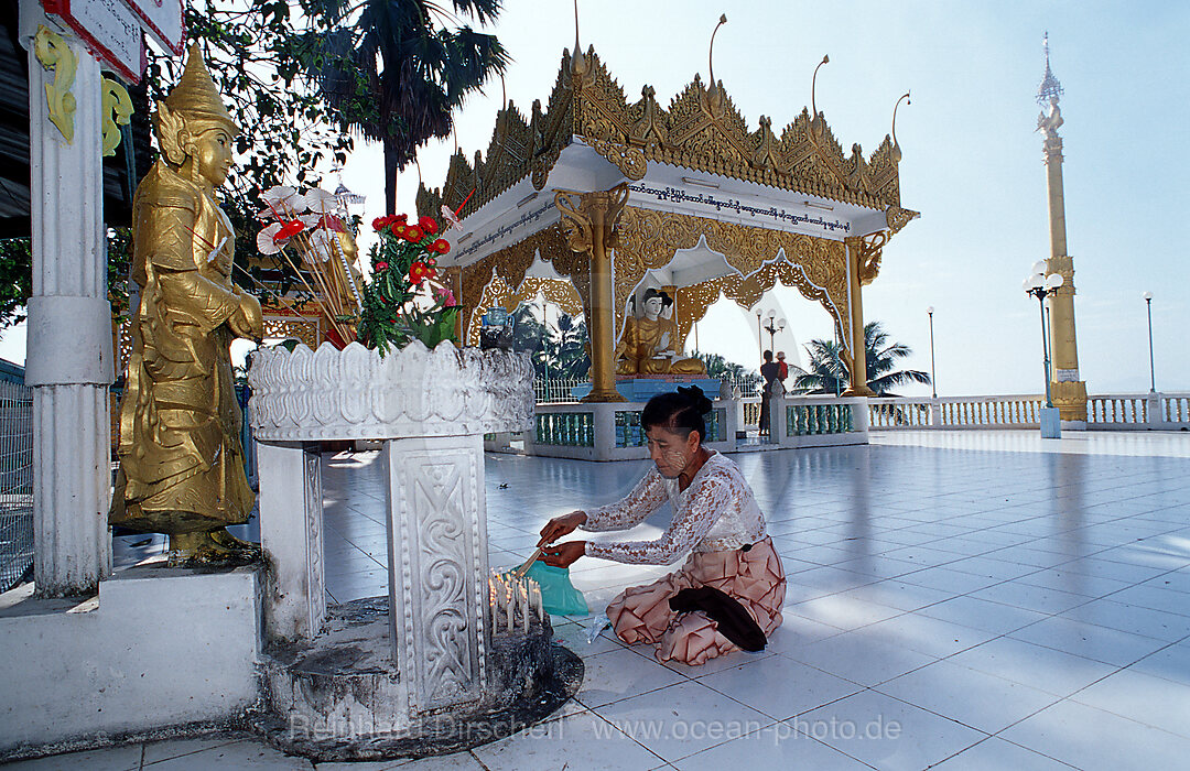 Praying woman in temple, Kawthaung, Burma, Myanmar, Birma