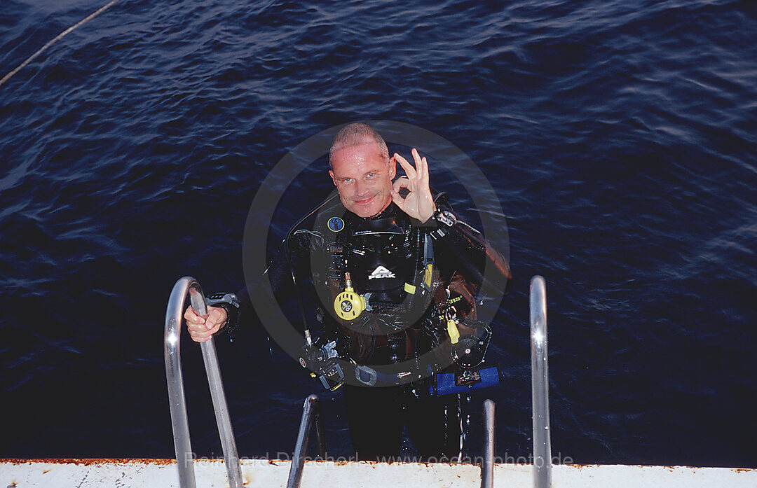 Scuba diver on a liveaboard, Thailand