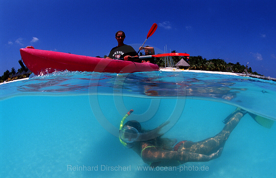 Snorkeling woman near maldives island Kuredu, Indian Ocean, Lhaviyani Atoll, Kuredu, Maldives Island