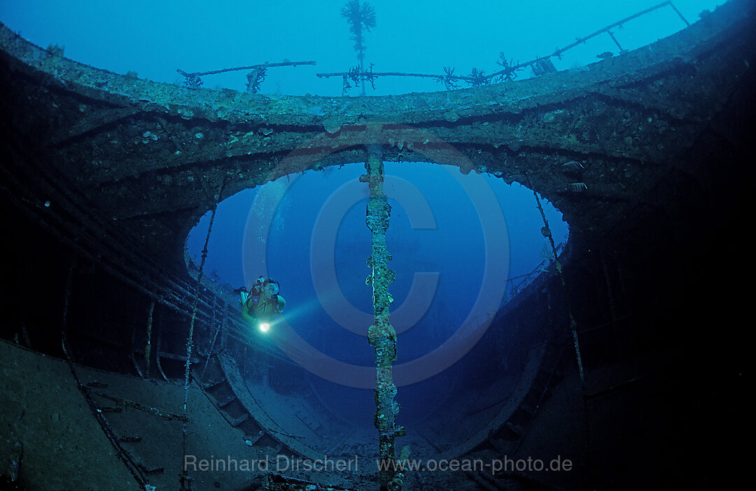 Scuba diver in ship wreck, Pacific Gas