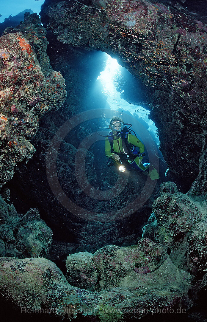 Scuba diver in underwater grotto