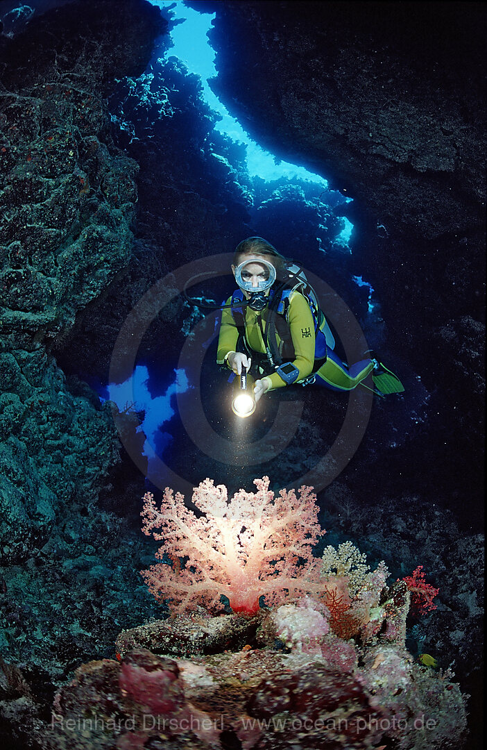 Scuba diver in underwater grotto