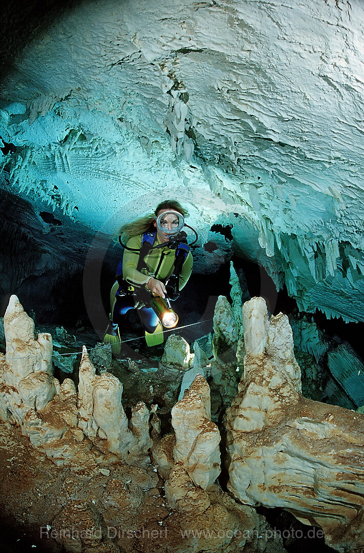 Scuba diver in underwater cave Cueva Taina