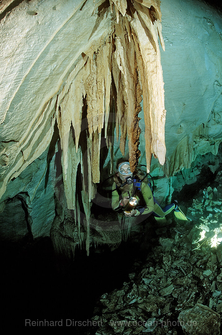 Scuba diver in underwater cave Cueva Taina
