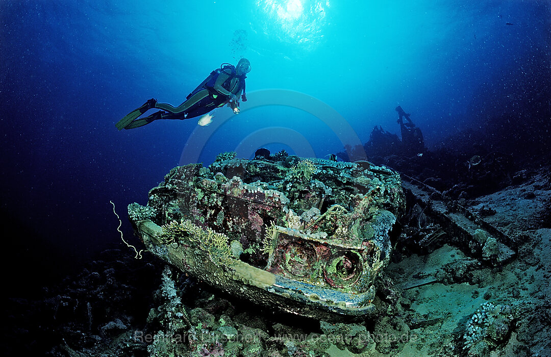 Scuba diver and Car wreck near Blue Belt shipwreck