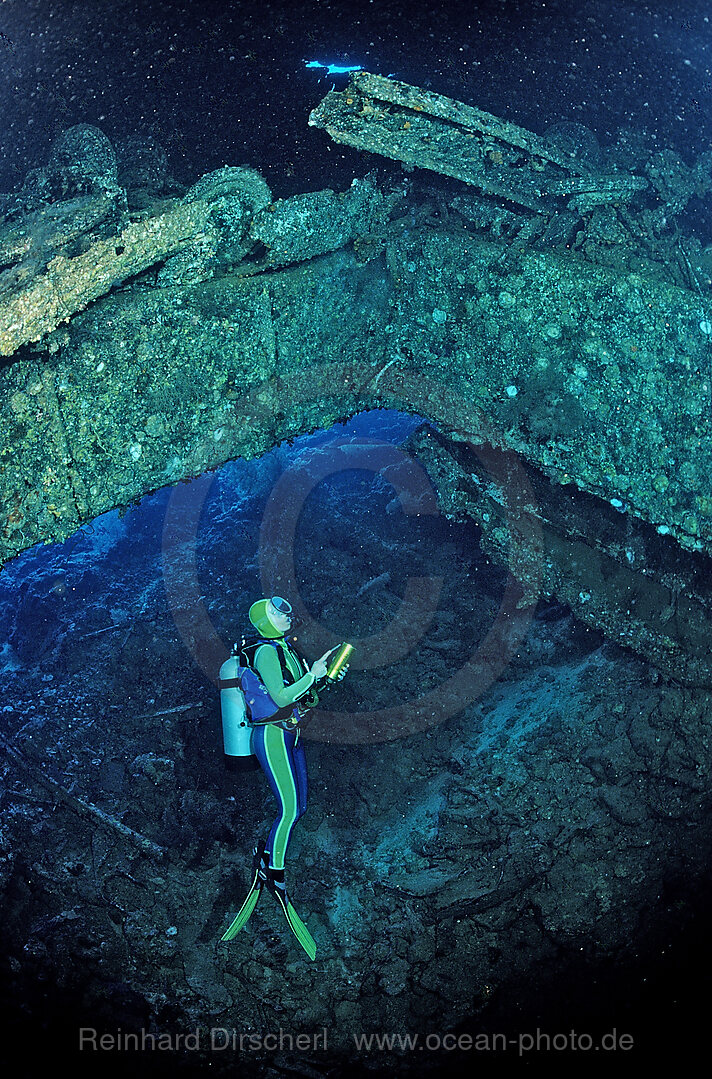 Scuba diver and Truck wreck in Blue Belt shipwreck