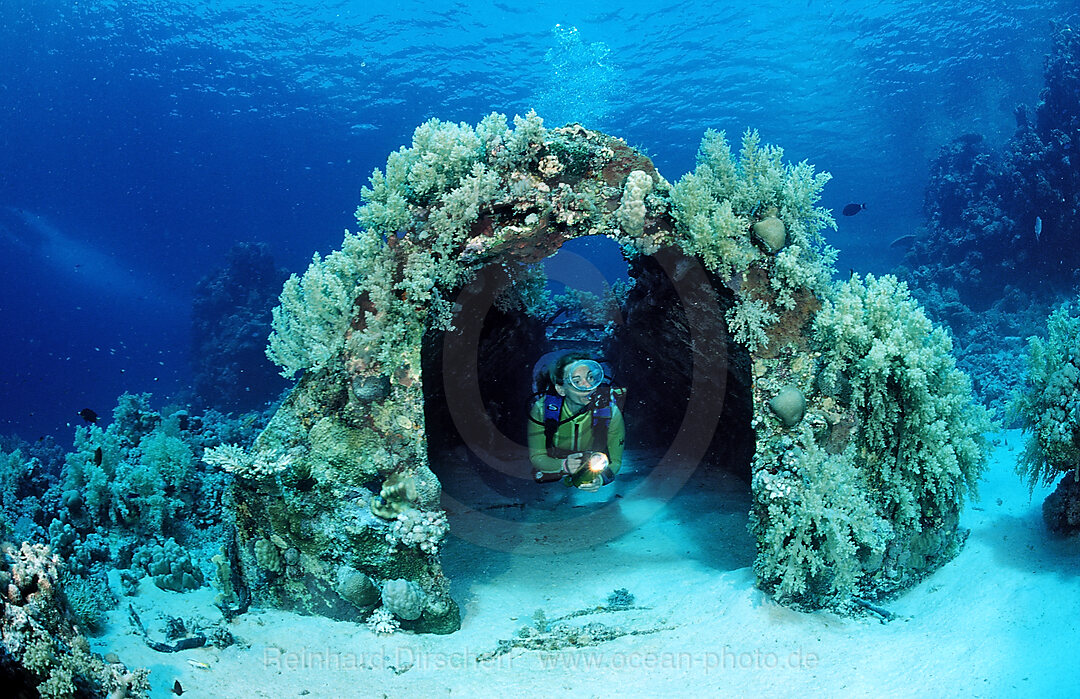 Scuba diver and Jacque Cousteaus Precontinent 2