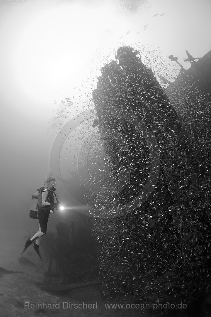 Diver at Torpedo Tubes at Destroyer USS Anderson