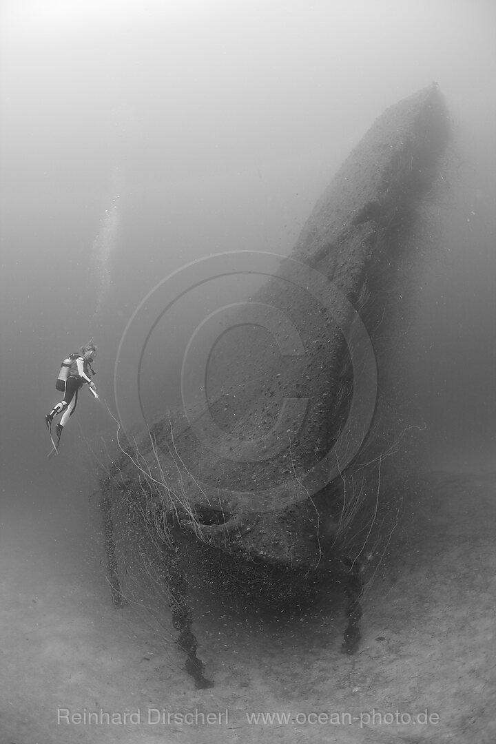 Diver at Bow of USS Arkansas Battleship, Bikini Atoll, Micronesia, Pacific Ocean, Marshall Islands