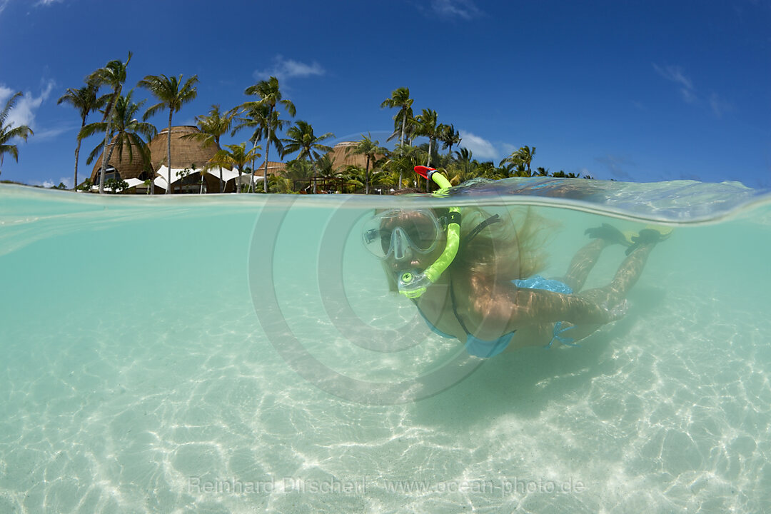 Woman snorkels at Maldives, South Male Atoll, Maldives