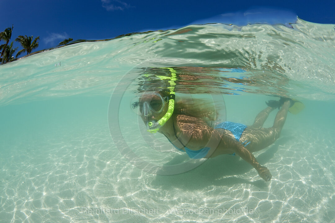 Woman snorkels at Maldives, South Male Atoll, Maldives