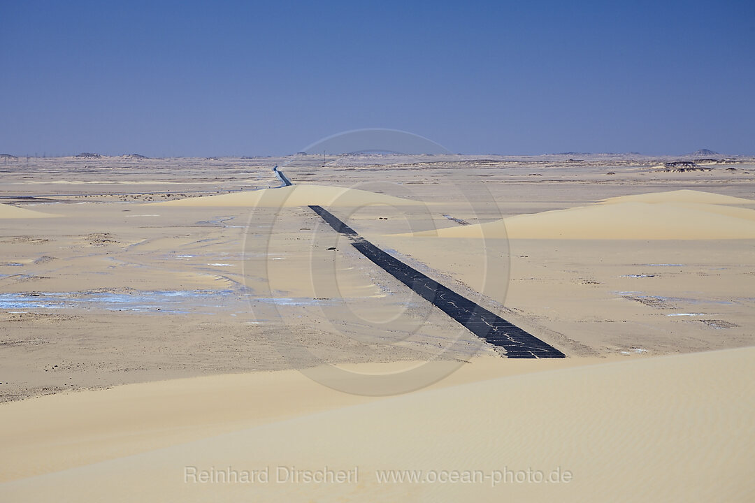 Drifting Sand Dunes crossing Street