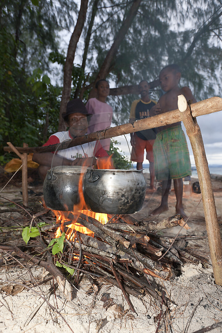 Natives coocking at Beach