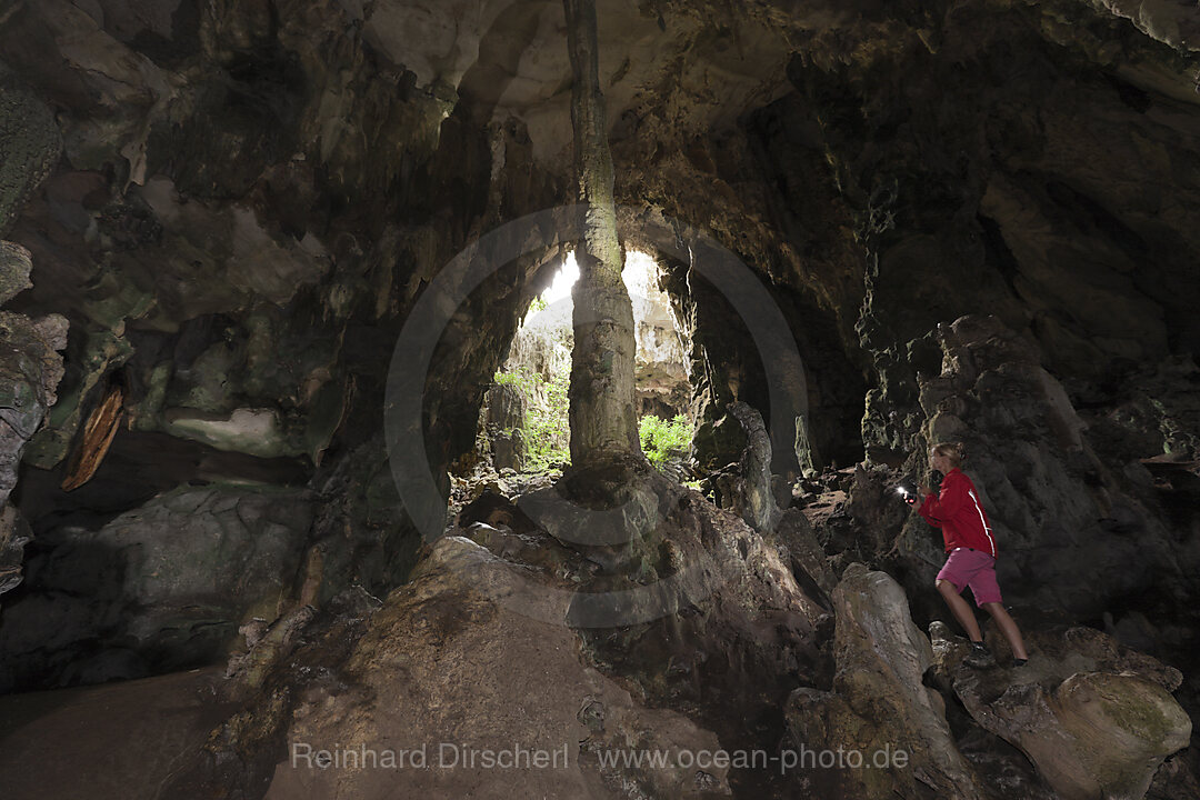 Tourist inside Kotilola Cave
