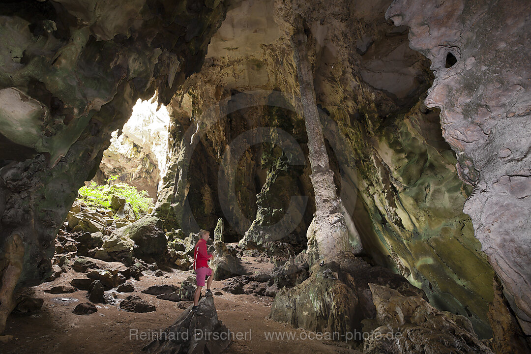 Tourist inside Kotilola Cave