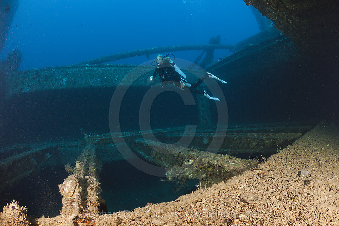 Scuba Diver over Cargo Space of Maldive Victory Wreck