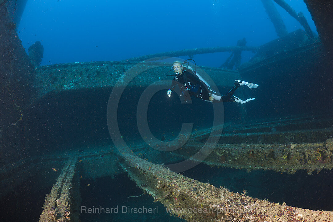 Scuba Diver discover Radio at Maldive Victory Wreck