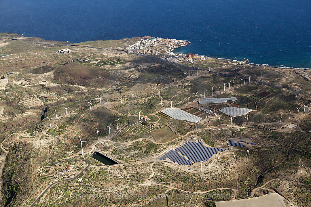 Aerial View of Solar Collectors and Wind power station