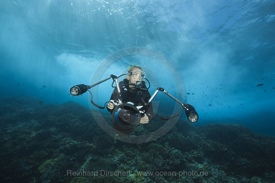 Scuba diver in surf zone, Christmas Island, Australia