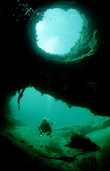 Cave diving, Scuba diver in underwater cave
