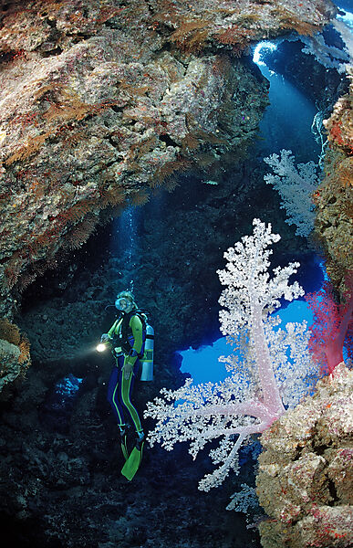 Scuba diver in underwater grotto