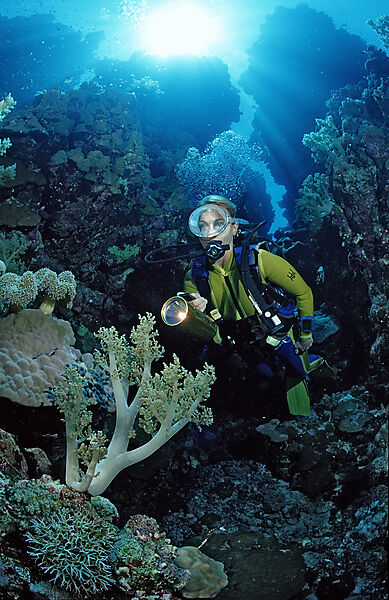 Scuba diver in underwater grotto