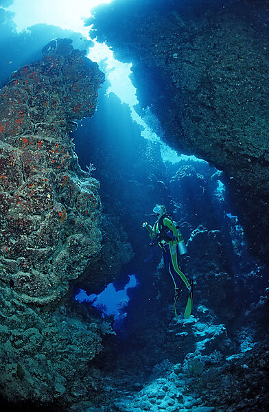 Scuba diver in underwater grotto