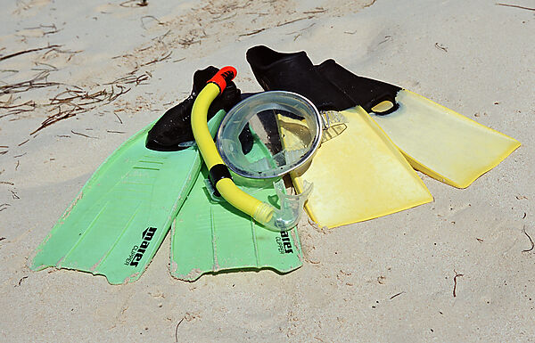 Fins and mask on the beach
