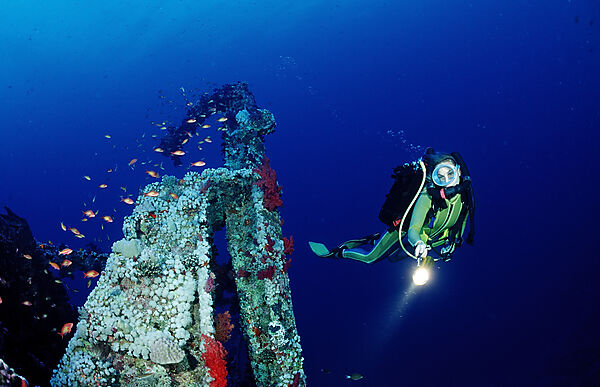 Scuba diver exploring shipwreck Numibia