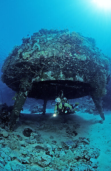 Scuba diver and Jacque Cousteaus Precontinent 8