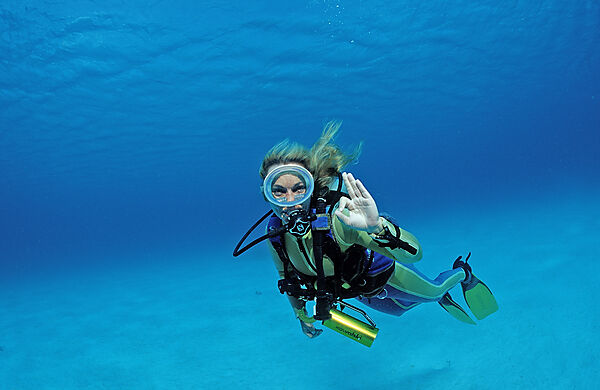 Scuba diver shows o.K. signal
