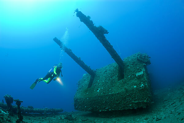 Diver and Twin 8-inch 55 caliber Gun on USS Saratoga