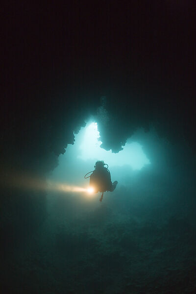 Diver at Entrance of Chandelier Dripstone Cave