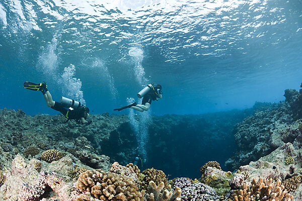 Diver at upper Entrance of Blue Hole Cave