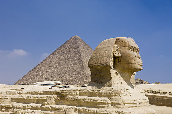 Great Sphinx of Giza against Cheops Pyramid