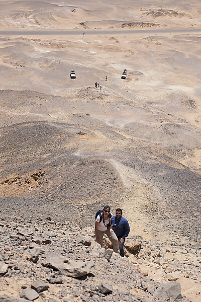 Tourists climbing Hill at Black Desert