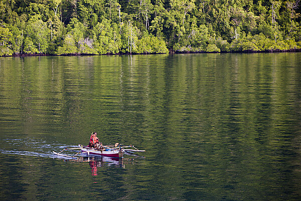 Fisherman in Outrigger