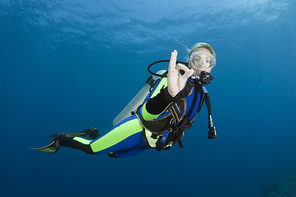 Scuba Diver shows O.K. Signal