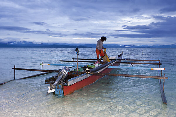 Fisherman on Outrigger Boat