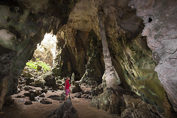 Tourist inside Kotilola Cave