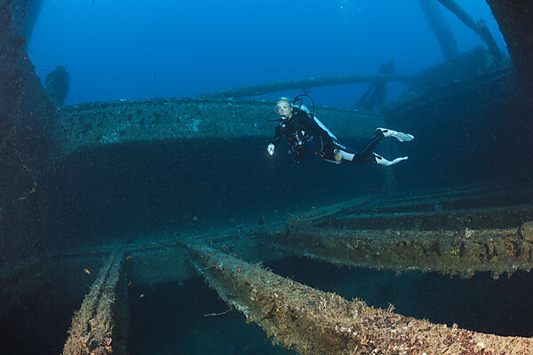 Scuba Diver discover Radio at Maldive Victory Wreck