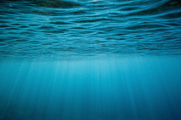 Sunbeams filtering through Water Surface
