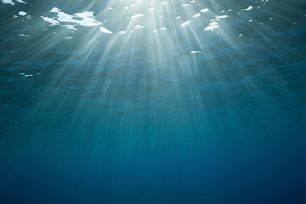 Sunbeams filtering through Water Surface