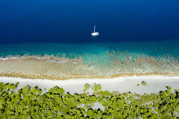 Catamaran at Kauehi Atoll, Tuamotu Archipel, French Polynesia